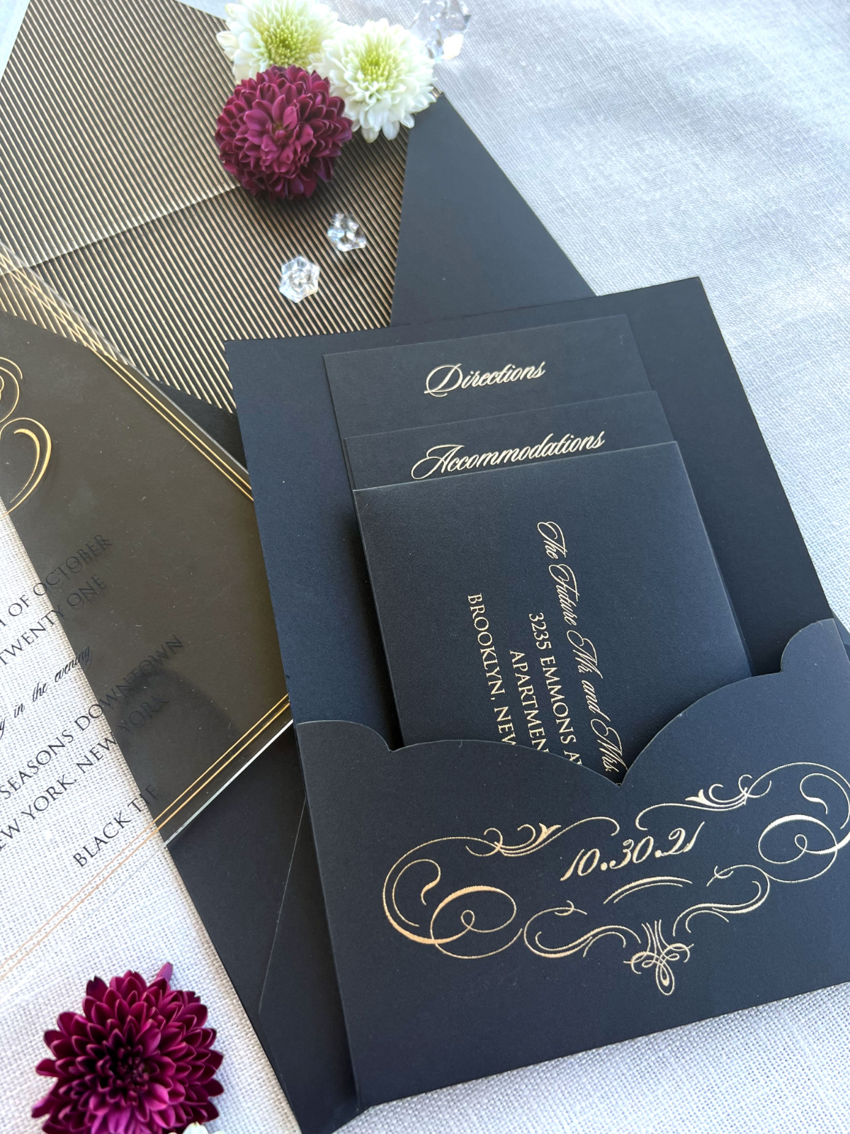 Classic black and gold pocket invitation suite with calligraphy inserts and structured layout, a custom wedding invitation design that feels formal, polished, and timeless.